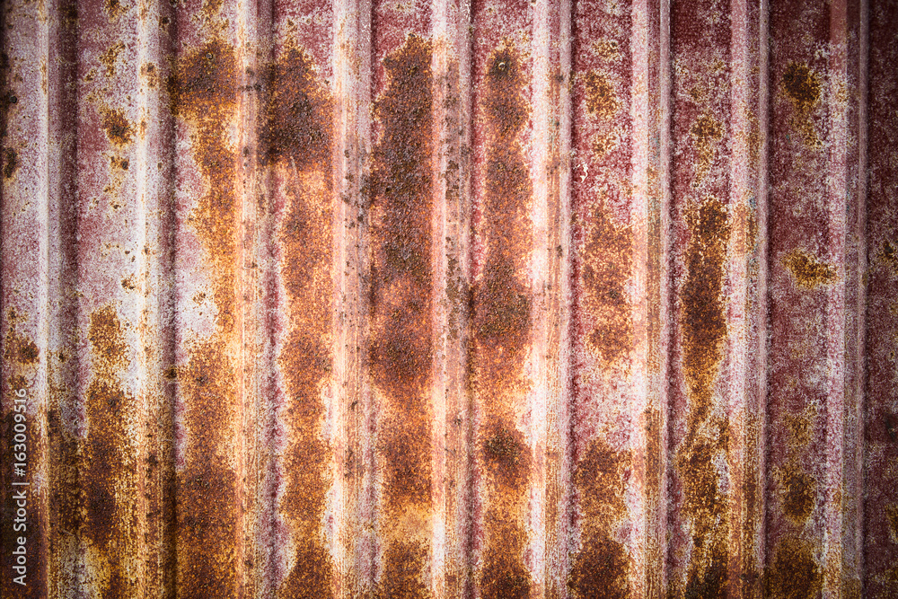 Naklejka premium Old rusty zinc sheet wall