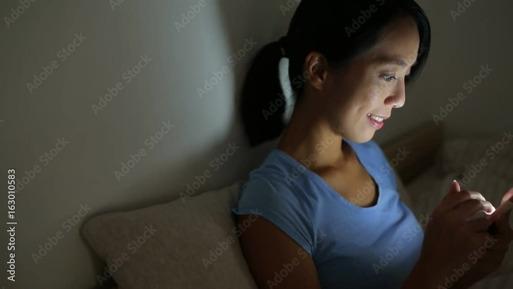 Woman using cellphone for online shopping
