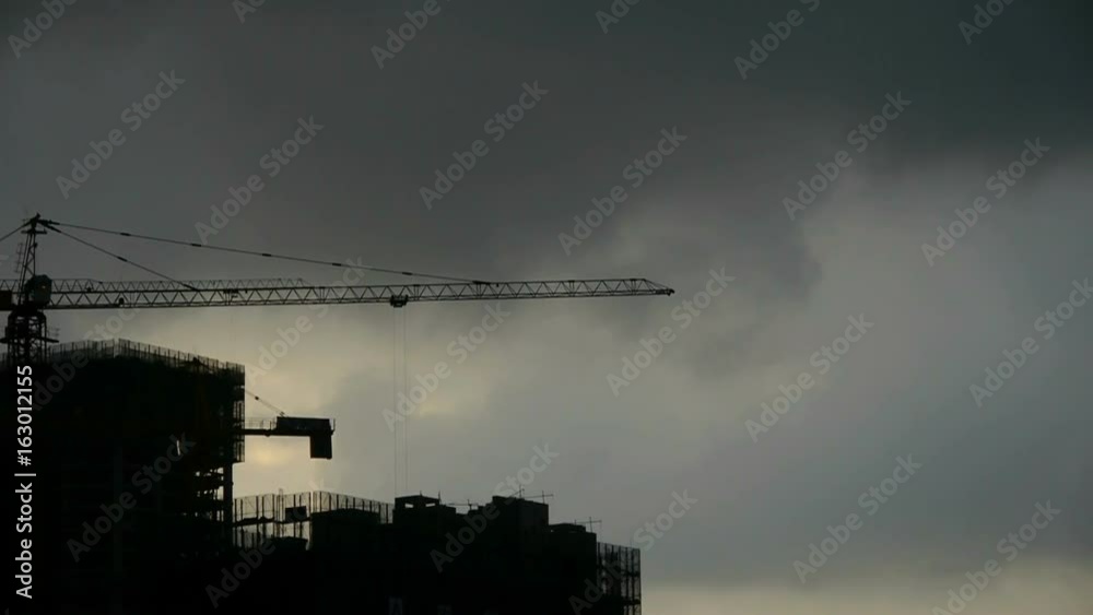 Dark clouds cover sun sky,building high-rise,House silhouette. Dark clouds cover sun sky,building high-rise,House silhouette.
