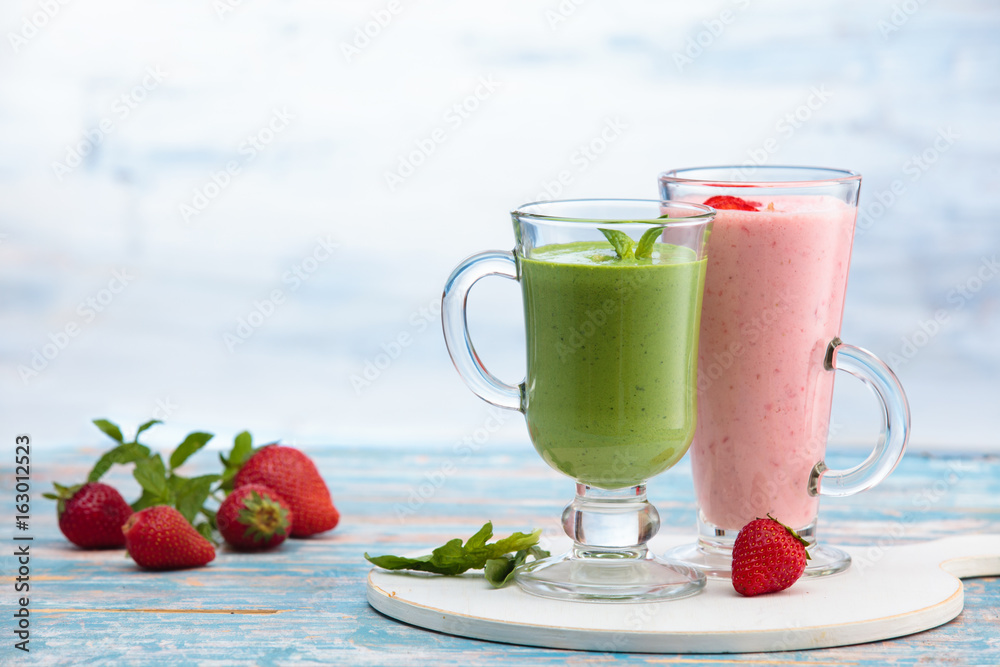 Different milkshakes on the table. Different milkshakes on the table.