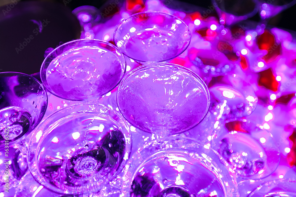 cocktails on a open air party, martini, vodka with bubbles,and others on decorated catering bouquet wedding table on open air event,