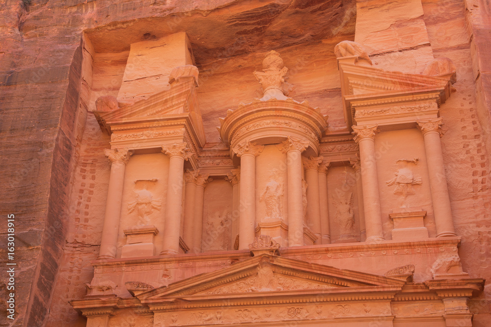 The decorative urn in detail on the upper part of the treasury of Petra