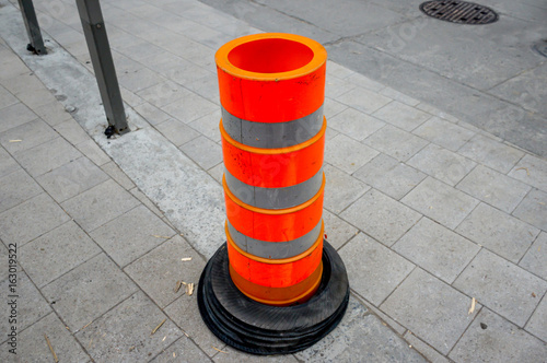 Traffic cone on construction road in Montreal downtown