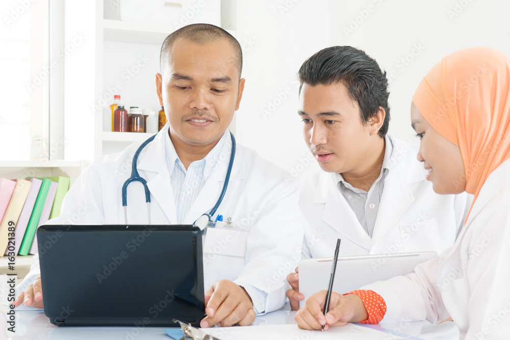 Medical doctors meeting at hospital office. Medical doctors meeting at hospital office.