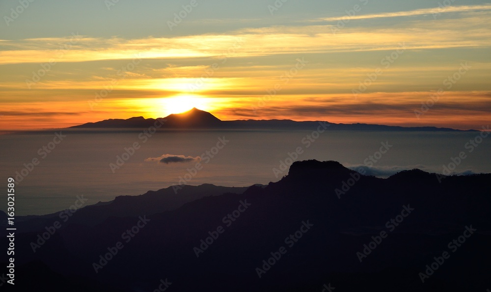 Sunset, mountains of Gran canaria and the Tenerife island, Canary islands