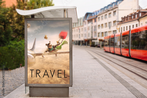 Billboards with advertising of conceptual travel. At city street photo