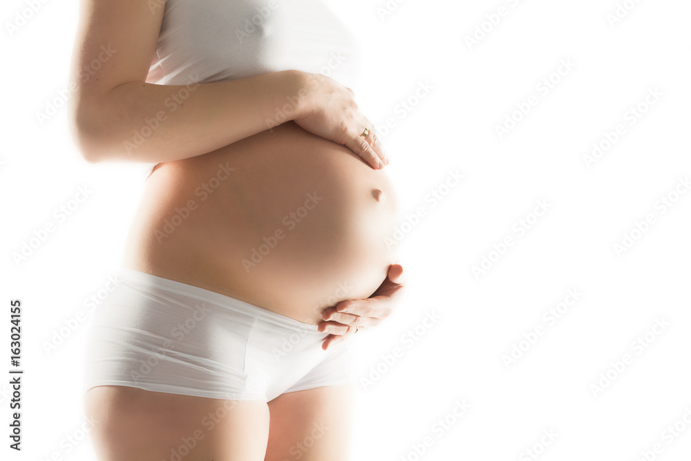 Pregnant woman touching her belly. Pregnant woman touching her belly.