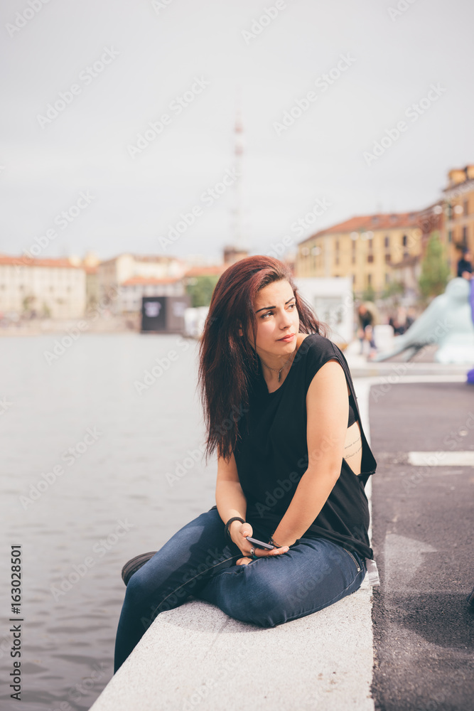 Fototapeta premium Young beautiful reddish brown hair girl