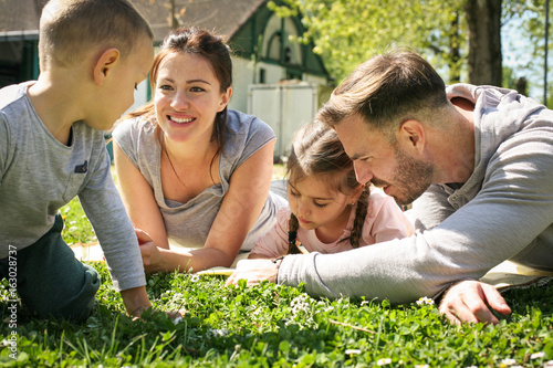 Happy family enjoying in spring day together. photo