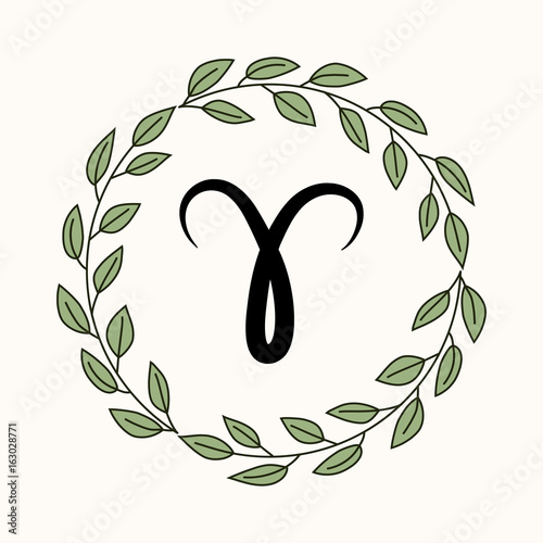 Hand drawing flat aries symbol in rustic floral wreath