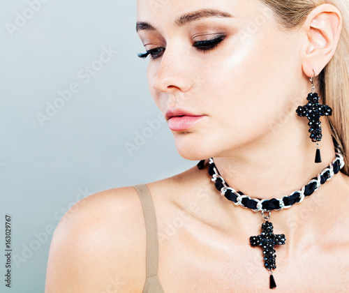 Beautiful Fashion Model Woman with Jewelry Earrings and Necklaces