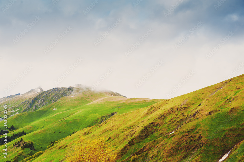 Fototapeta premium Beautiful mountain landscape in fog and sky