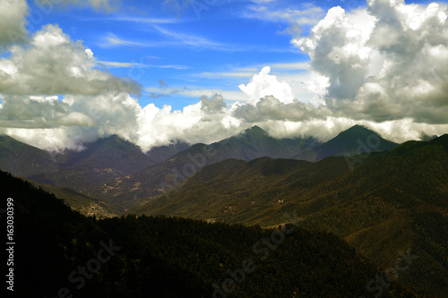 mountain with cloudy sky