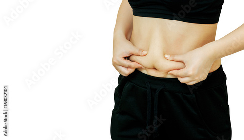 woman hand pinching fat body belly paunch on white and clipping path