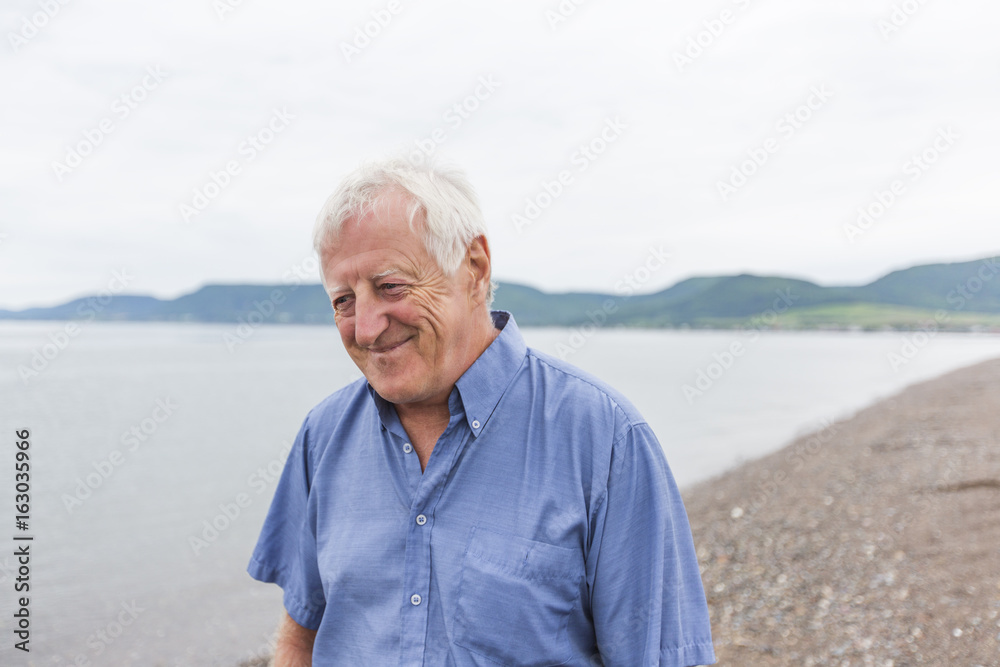Senior Man at the beach having good time Senior Man at the beach having good time