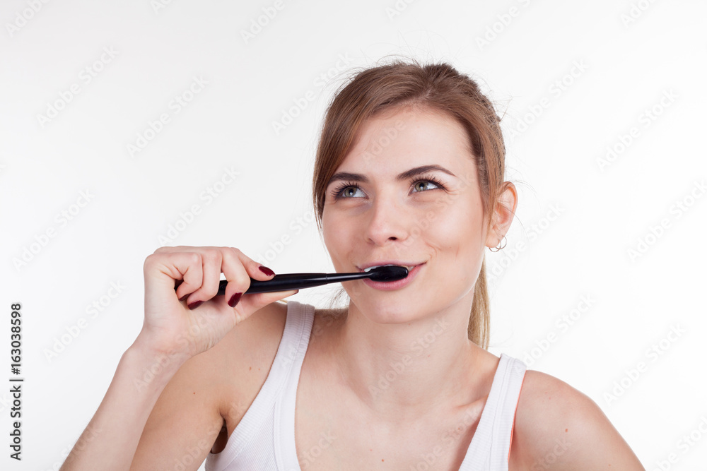 pretty girl in the bathroom brushing his teeth smile pretty girl in the bathroom brushing his teeth smile