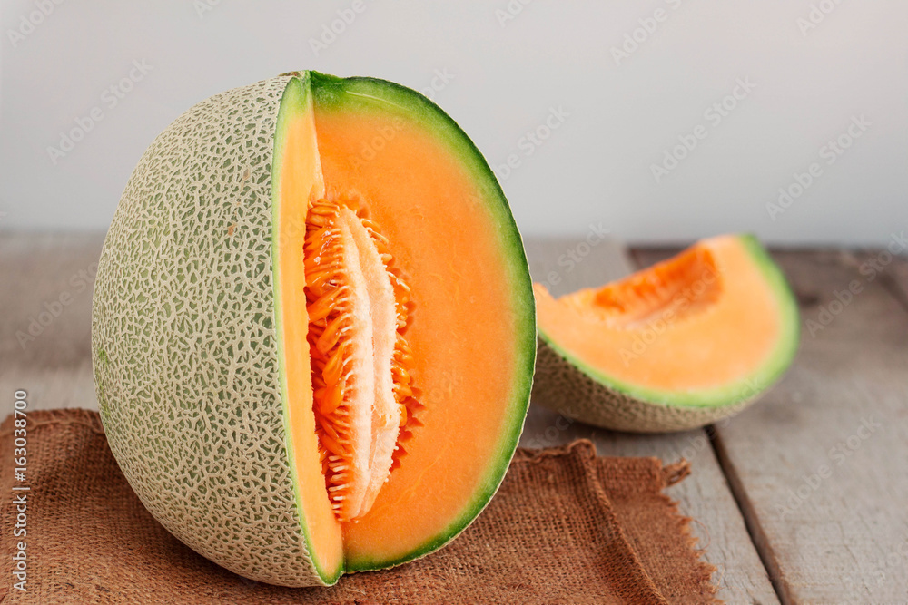 melon cut on wooden. melon cut on wooden.