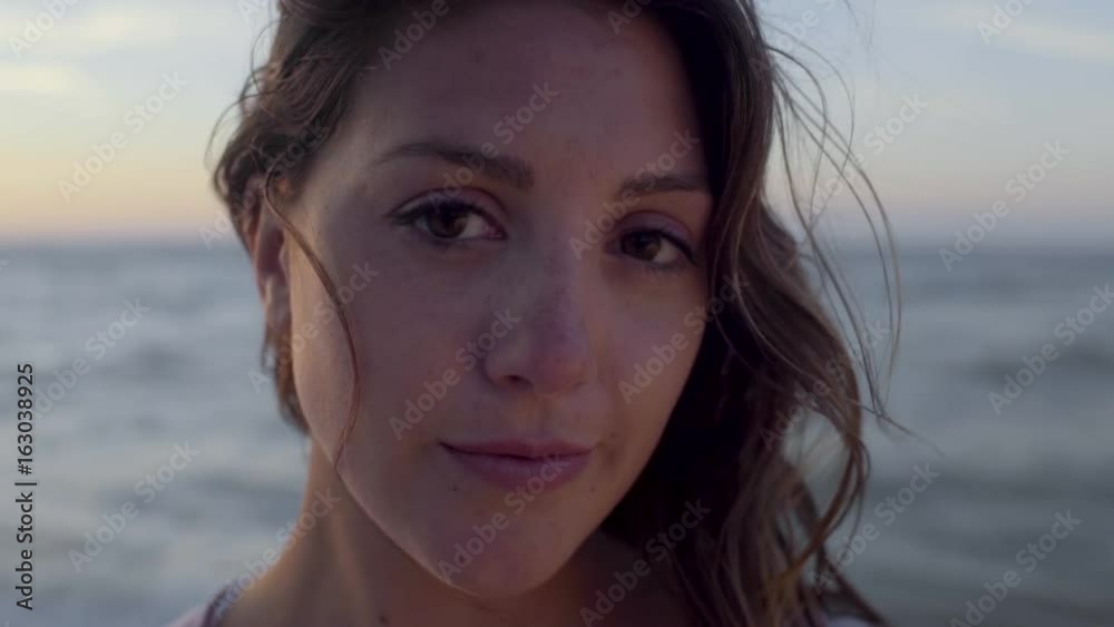 Portrait Of Young Woman Smiling At The Beach