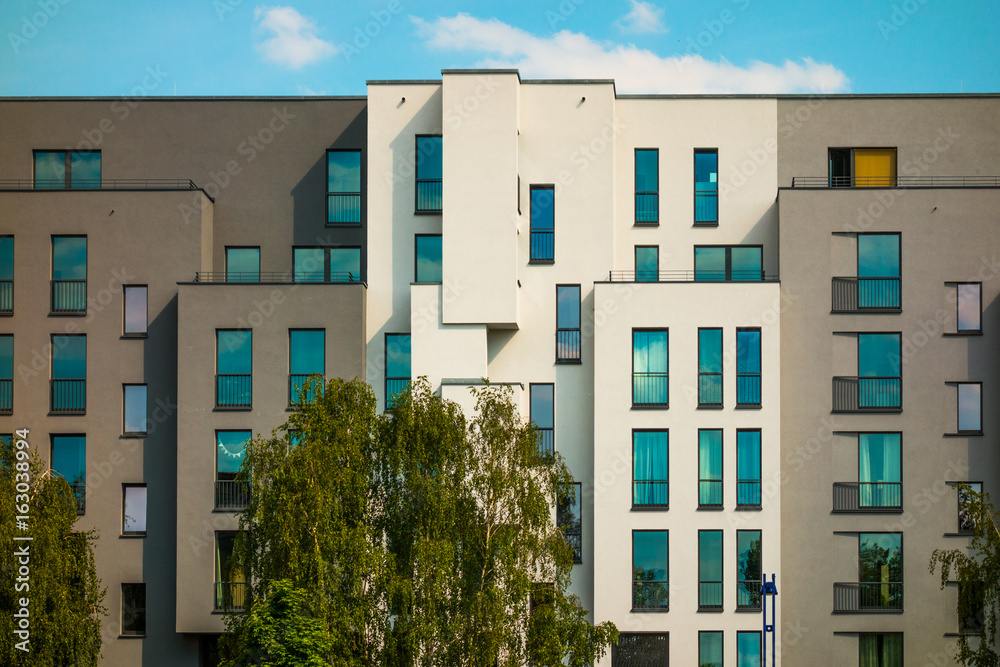 very modern apartment house with grey and white facades very modern apartment house with grey and white facades
