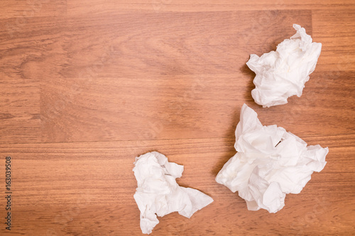 Used Tissue paper that Wiped the semen was left on the floor beside the bed. photo