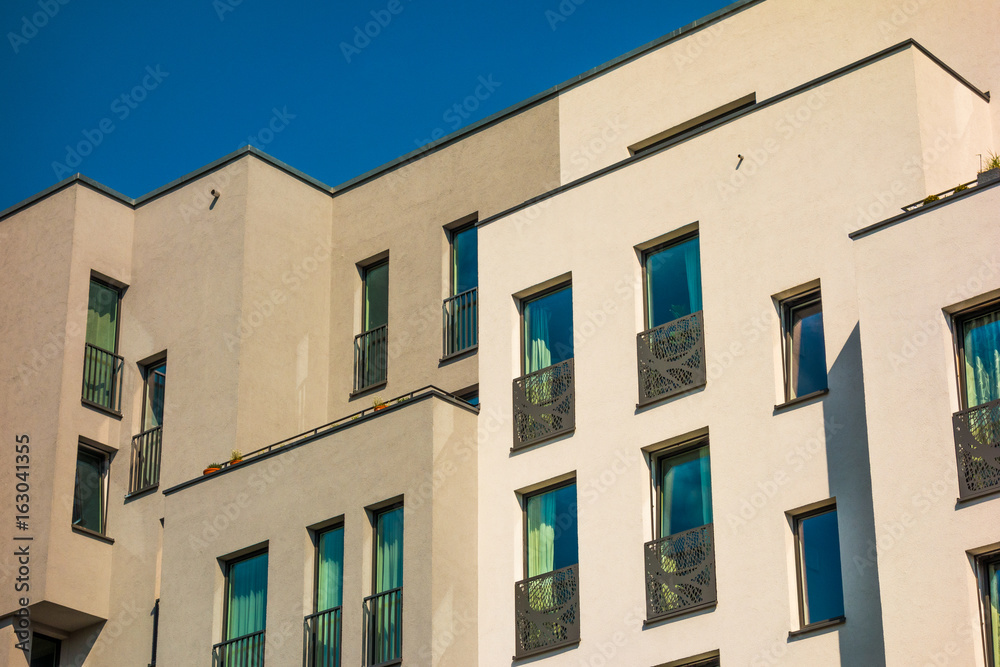 detailed view of block formed apartment facade detailed view of block formed apartment facade