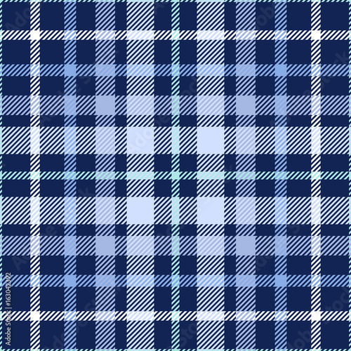 Seamless tartan plaid pattern. Checkered fabric texture print in shades of blue and white.