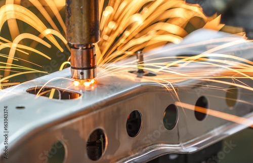 Spot welding machine, automotive part in a car factory
 photo