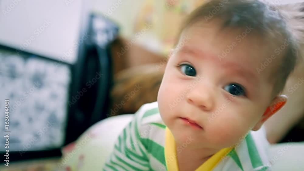Newborn baby crawling on the floor Newborn baby crawling on the floor