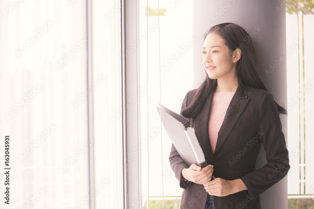 Asian woman looking on other place with smiling, woman leader concept. Asian woman looking on other place with smiling, woman leader concept.