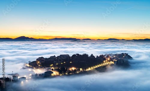 A particularly attractive view of the Sicilian town, Polizzi Generosa when low cloud (the so-called maretta) photo