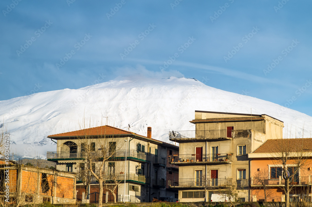  Bronte town under the snowy and majestic volcano Etna