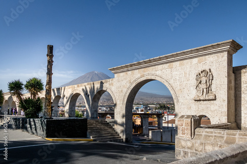 The Arches of Yanahuara Plaza and Misti Volcano on Background - written on the arches are quotes of famous people of the city - Arequipa, Peru photo