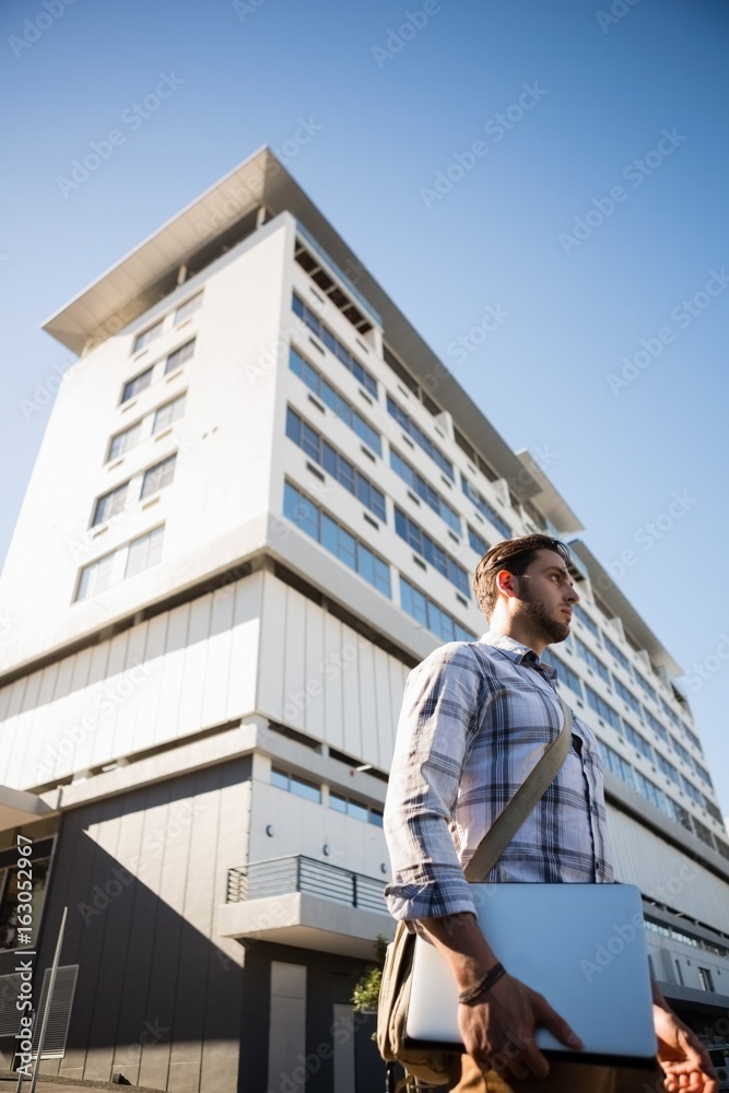 custom made wallpaper toronto digitalThoughtful man looking away while standing on city street