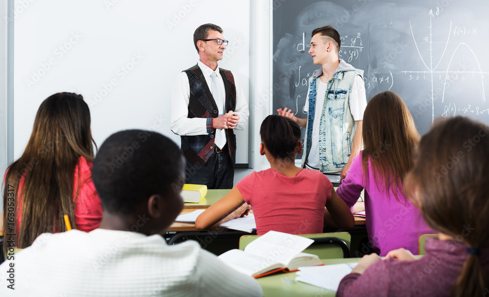 Fototapeta premium Students and teacher in class