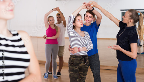 Portrait of teenagers studying of partner dance