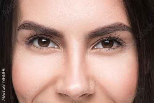 Happy young woman with cheerful eyesight