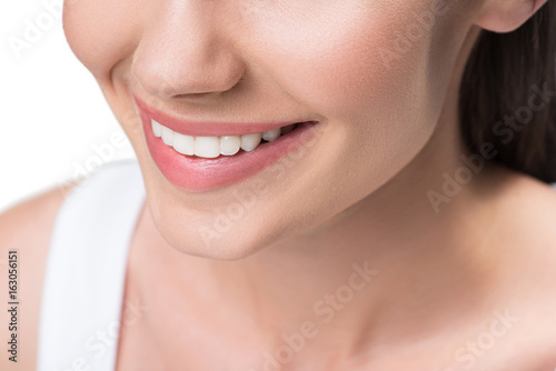Smiling young woman with perfect white teeth