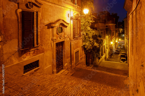 Canvas Print Rome. Old street with a staircase at night.