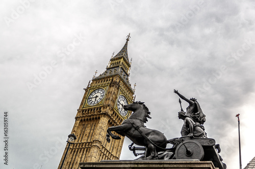 Statue of Boudicca with chariot and horses  near Westminster  Big Ben and the Houses of Parliament. London