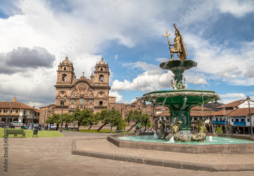 Plaza de Armas with Inca Fountain and Compania de Jesus Church - Cusco, Peru