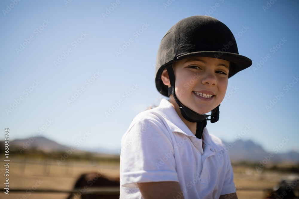 Girl smiling at camera in the ranch Girl smiling at camera in the ranch