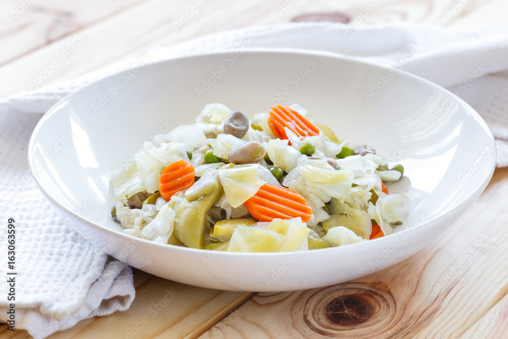 Spanish Style Veggie Stew. Menestra de Verduras. Diet and healthy food concept. Spanish Style Veggie Stew. Menestra de Verduras. Diet and healthy food concept.