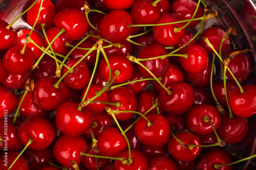 large ripe red cherries large ripe red cherries