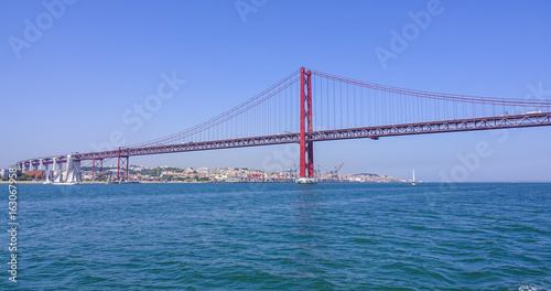 Famous 25th April Bridge over River Tajo in Lisbon aka Salazar Bridge - LISBON - PORTUGAL - JUNE 17, 2017