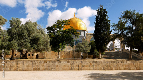 Dome of the Rock in Jerusalem over the Temple Mount. Golden Dome is the most known mosque and landmark in Jerusalem and sacred place for all muslims. photo