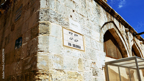 Via Dolorosa street sign in Jerusalem old city. Via Dolorosa is a sacred place for the all Christians in the world. Located in Holy land Jerusalem. Zoom shot. photo