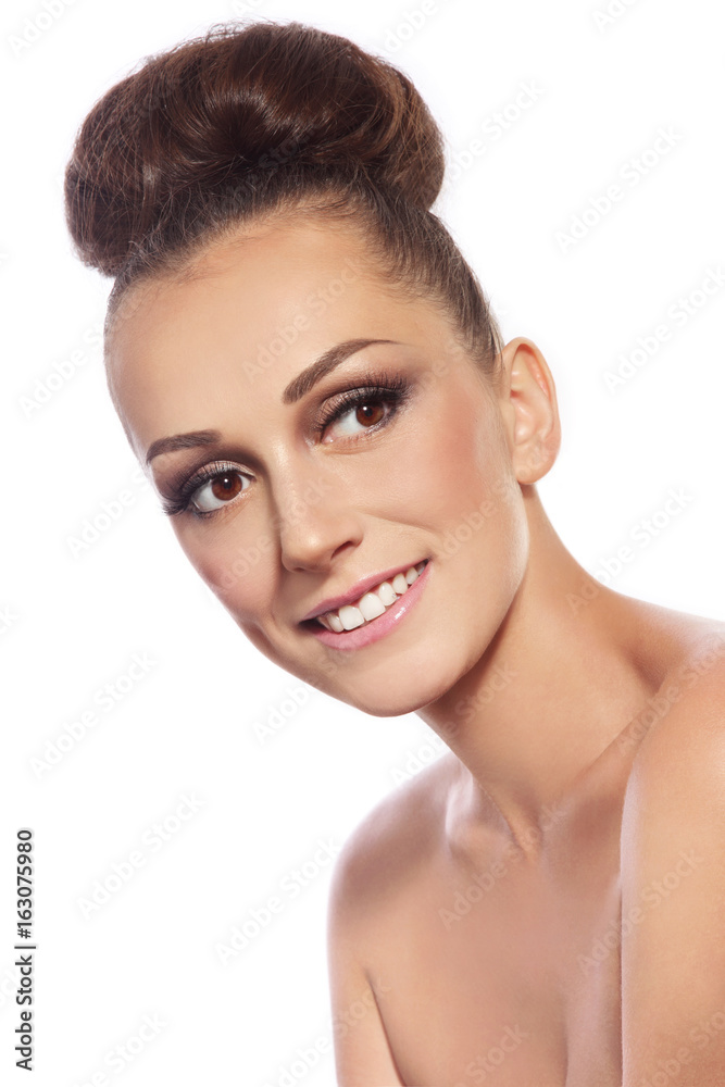 Young slim attractive smiling woman with stylish hair bun over white background, copy space Young slim attractive smiling woman with stylish hair bun over white background, copy space