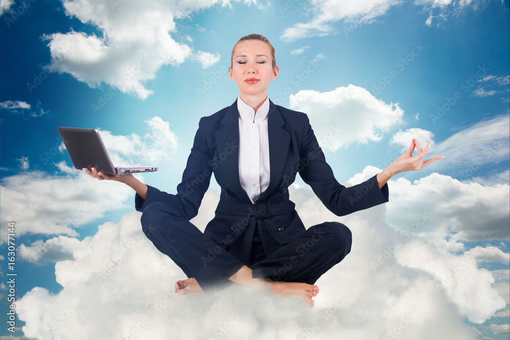 Businesswoman working in the sky and meditating Businesswoman working in the sky and meditating
