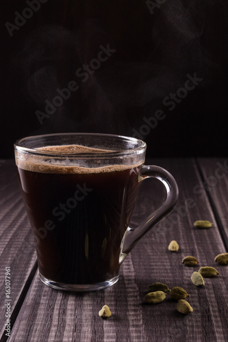 Coffee cup with cardamon