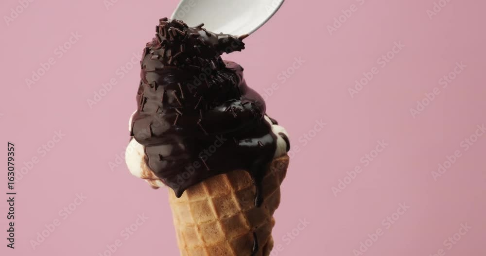 corn with an ice cream and a liquid chocolate topping